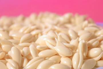 hot wax granules for depilation close-up.
body care, beauty industry
