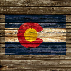 colorado co state flag on old rustic timber wall