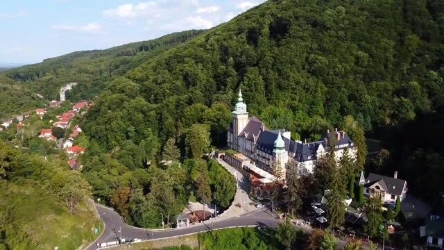 View of the Hunguest Hotel Palota, road and houses the village of Lillaf&uuml;red. Drone Video. Hungary. Europe	