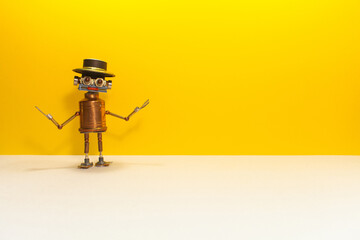 Retro style mechanical robotics character with black hat. Steampunk toy bot on yellow white...