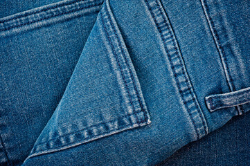 Textured blue denim texture stitched with a button-up texture.