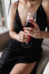 woman with glass of wine