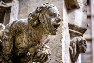 Fototapeta na wymiar historic sculpture (gargoyle) at the city hall in munich