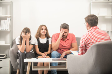 sad father mother and child at family psychologist, therapy