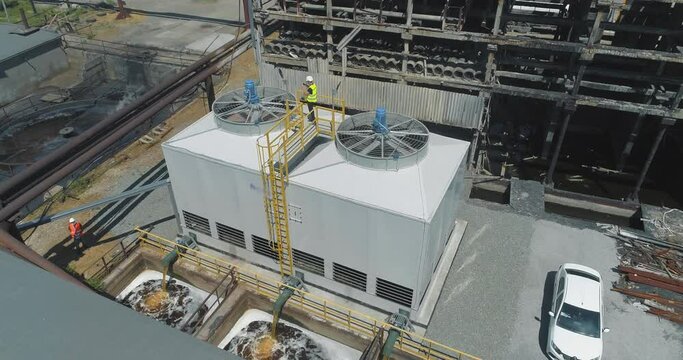 Cooling tower at the factory. Factory cooling system. Wet type cooling tower. Cooling tower drone view