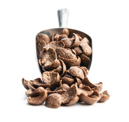 Sweet chocolate breakfast cereal flakes in scoop.