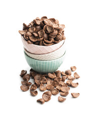 Sweet chocolate breakfast cereal flakes in bowl.
