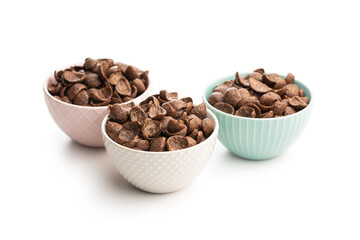 Sweet chocolate breakfast cereal flakes in bowl.