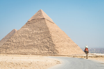 landscape of giza plateau with pyramids at background