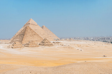 landscape of giza plateau with pyramids at background
