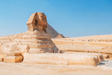 sphinx monument with pyramids at background, egypt