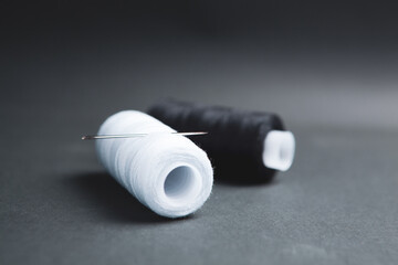 black and white thread on the table