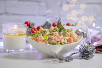 Fototapeta na wymiar festive salad olivier, christmas background restaurant refreshment