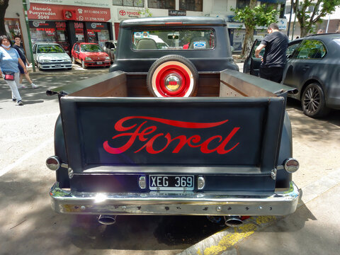 BUENOS AIRES, ARGENTINA - Nov 08, 2021: Ford F100 pickup truck circa 1960 Custom Cab Flareside bed. Rear view. Logo. Brand. Expo Warnes 2021
