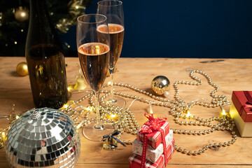 champagne glasses on wooden table
