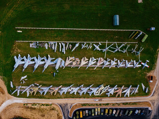 Aerial top view of military aircrafts in the airfield