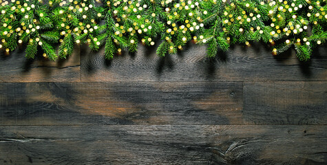 Christmas background golden lights pine tree branches