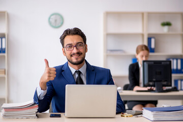 Two colleagues working in the office