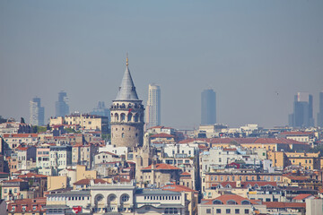 Obraz premium istanbul,turkey galata tower,cityscape and istanbul view from suleymaniye mosque's garden in istanbul with historical and modern buildings.