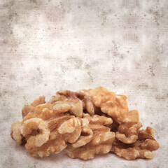 square stylish old textured paper background with walnuts from Gran Canaria