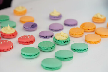 Different types of macarons been prepared. Close up photo.