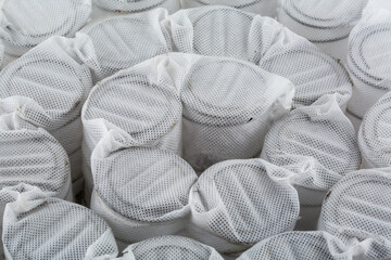 Independent mattress springs in spunbond