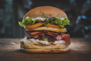 hamburger, lettuce, tomato, bacon, egg