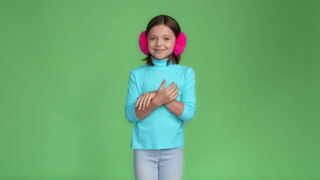 Low autumn temperature child tremble warm isolated green color background