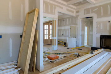 View of on stacker wooden material door molding trim with new house of under construction