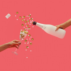 New Year's party celebration. Holiday concept. White bottle of champagne and elegant glass. Glitter...