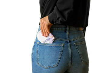 A woman puts money in her pocket. A 500 euro bill in the back pocket of her jeans