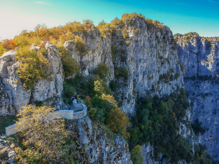 Aerial panoramic view of the impressive Vikos gorge in the Zagoria region at Pindus Mountains of northern Greece. It lies on the southern slopes of Mount Tymfi and it is the the deepest in Europe.