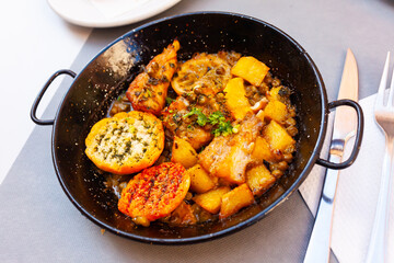 Valencian fish - lemon sauce, potatoes and croutons. High quality photo