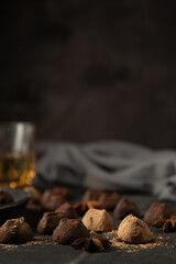 chocolate truffles over rustic wood table
