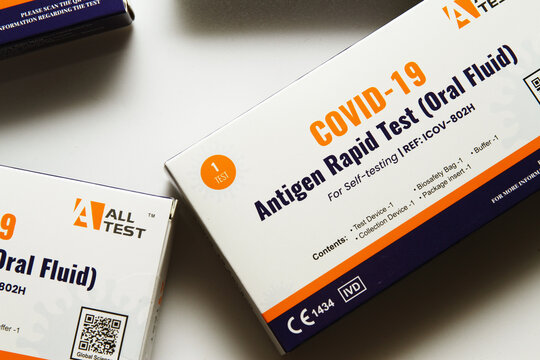 Kuala Lumpur Malaysia - December 10th 2021. Buying Alltest Covid-19 Antigen Rapid Test Oral Fluid At The Pharmacy