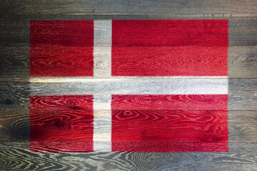 Denmark flag on rustic old wood surface background