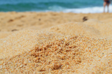 Fototapeta na wymiar Close-up of sand on the summer beach