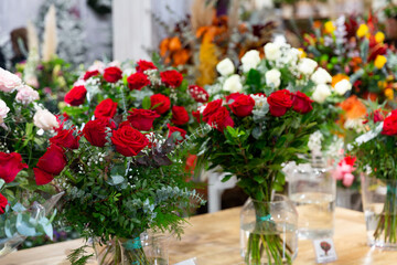 Fototapeta na wymiar Flowers for sale at the flower shop. Luxury bouquets for sale at a flower shop.