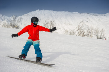 Fototapeta na wymiar Snowboarder in powder snow Hakuba Japan