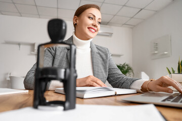 Female notary public working in office