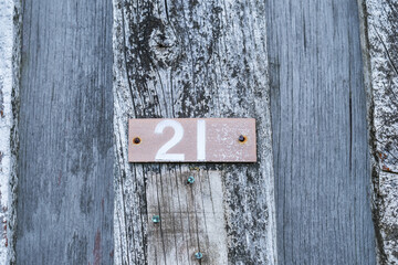 Number 21 on Wooden Pole