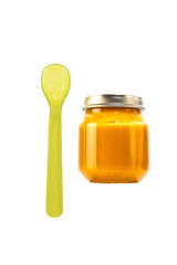 baby food in a jar isolate. baby puree in a transparent glass jar on a white background. fruit baby puree with spoon