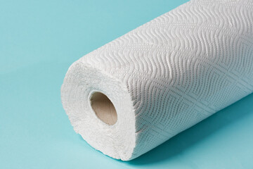 White toilet paper on blue color background. Toilet paper article. Textures on cotton paper.