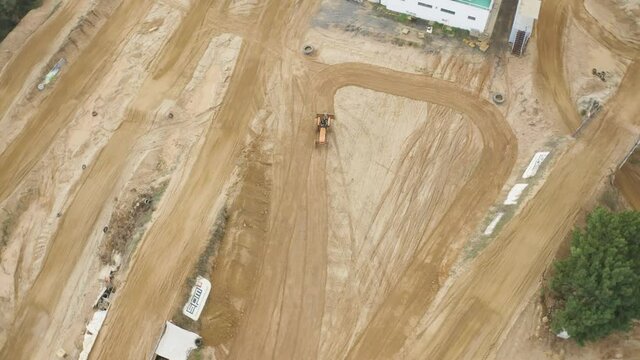 aerial top view of trator preparing the jumps