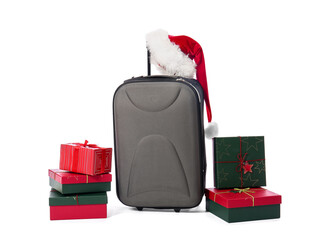 Suitcase with Santa hat and different gift boxes on white background. Christmas vacation concept