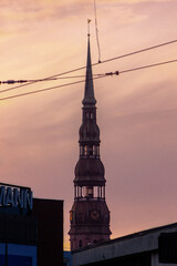 Vertical shot of the St. Peter's Church at sunset in Riga, Latvia