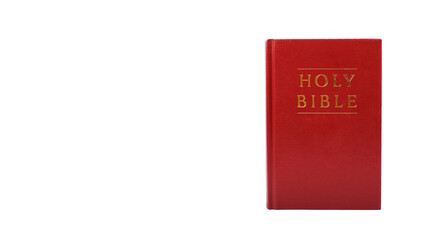 Bible with red cover color isolated on white background.