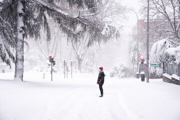 People walking on a street during heavy snow storm