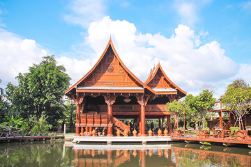 Traditional wood house in water at Tha Mai I temple  in Chiang Mai , Thailand