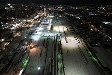 Aerial view of the railway in winter at night (Kirov, Russia)